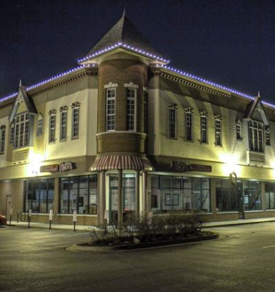 A commercial property illuminated for the holiday season