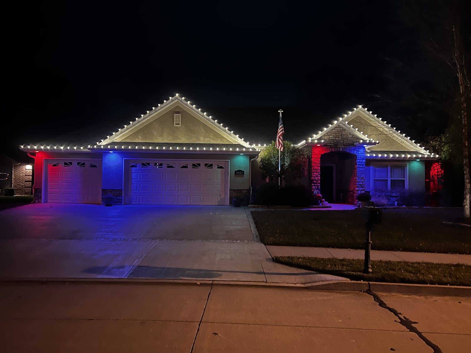 A home decorated with multicolor Christmas lights